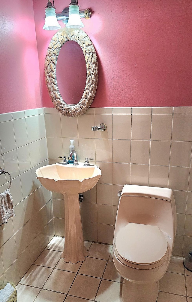 27 Maiden Ln, New City, NY 10956 - half bathroom featuring tile patterned floors and tile walls