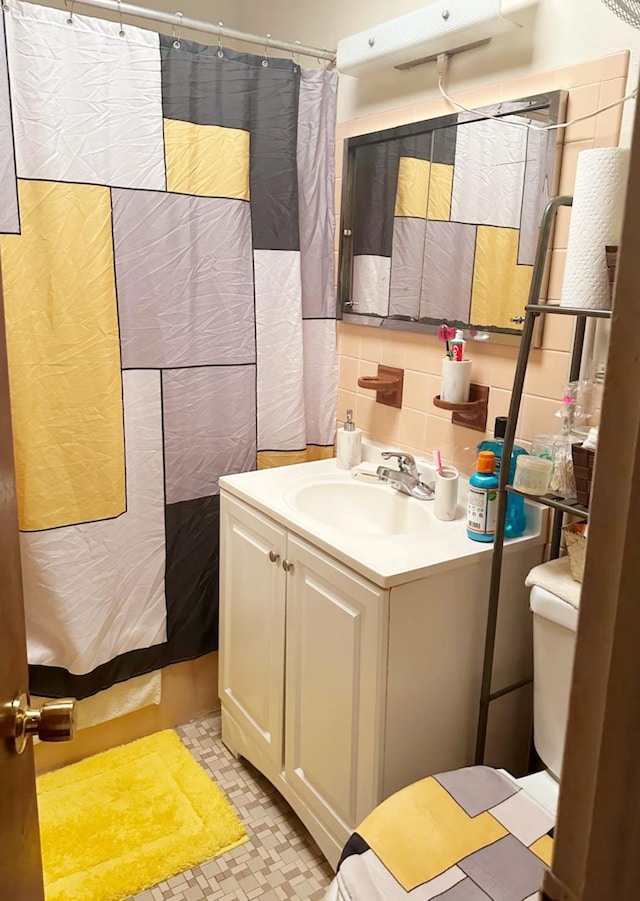 804 E 221st St, Bronx, NY 10467 - bathroom with vanity, tile patterned floors, and curtained shower