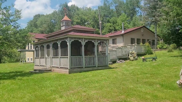 77 Krum, Hurleyville, NY 12747 - back of property featuring a yard, a sunroom, and a wooden deck
