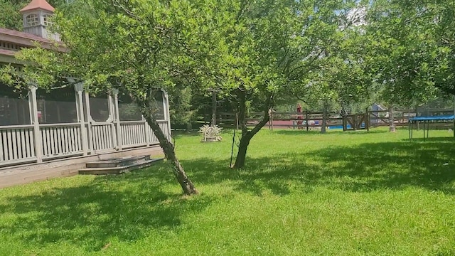 77 Krum, Hurleyville, NY 12747 - view of green lawn featuring a trampoline