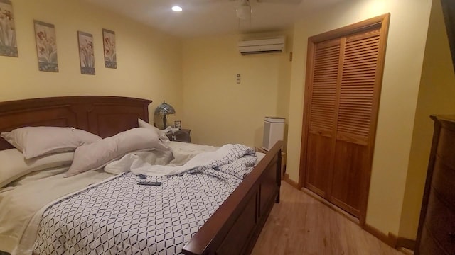 77 Krum, Hurleyville, NY 12747 - bedroom featuring a wall mounted AC, light wood-style floors, a closet, and recessed lighting
