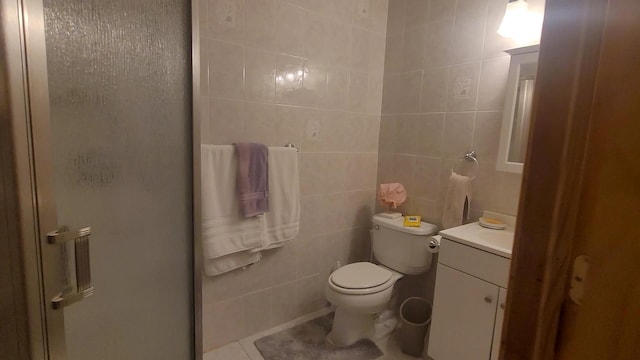 77 Krum, Hurleyville, NY 12747 - bathroom featuring a stall shower, vanity, tile walls, and tile patterned floors