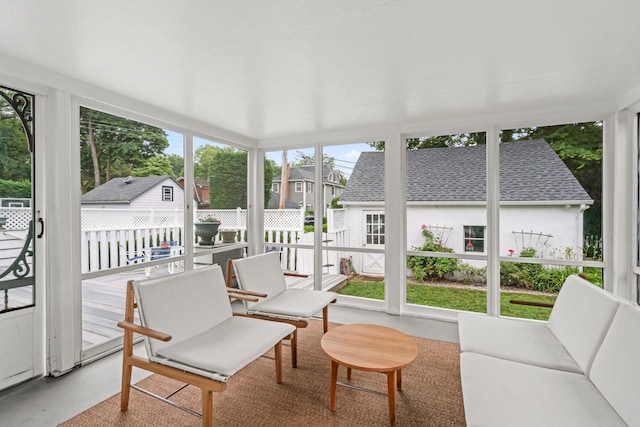 42 Valley Ave, Locust Valley, NY 11560 - sunroom / solarium with finished concrete floors and a residential view