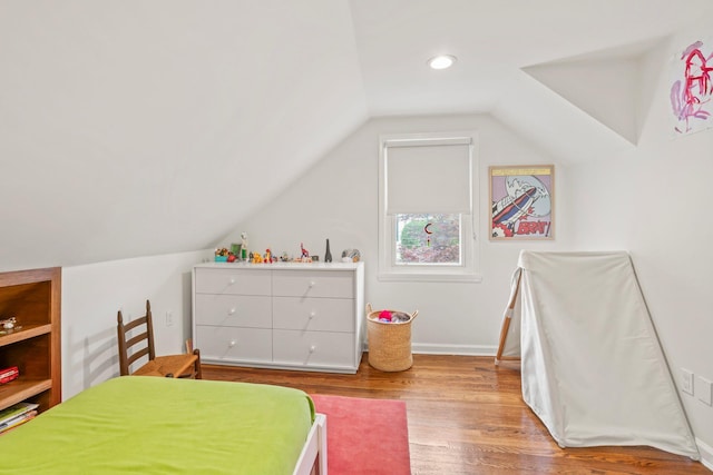 42 Valley Ave, Locust Valley, NY 11560 - bedroom with vaulted ceiling, wood finished floors, and recessed lighting