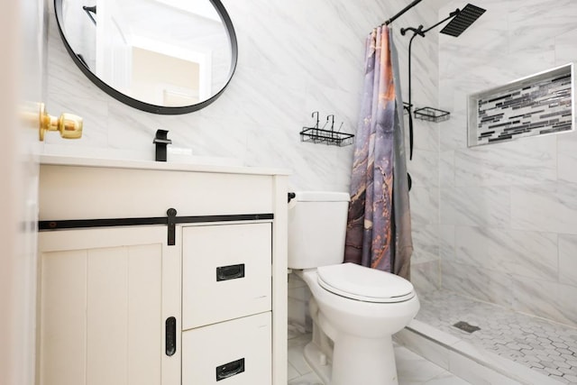10416 Rosita Rd, Ozone Park, NY 11417 - bathroom with marble look tiles, vanity, a tile shower, and tile walls