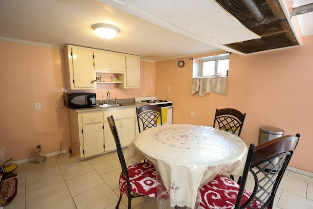 10416 Rosita Rd, Ozone Park, NY 11417 - dining area featuring bar with sink, light tile patterned floors, and crown molding