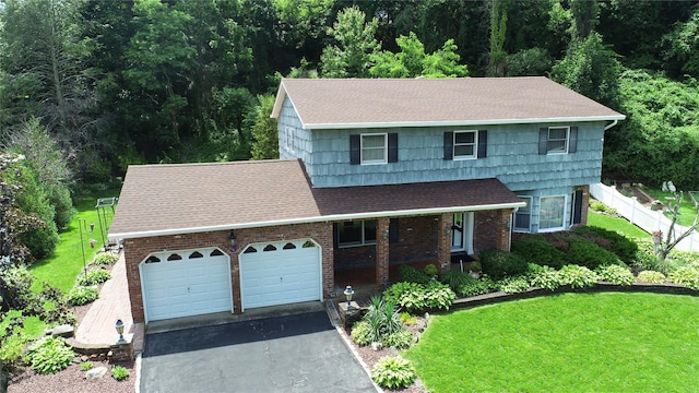 3 New Jersey Ct, Dix Hills, NY 11746 - view of front of home with a shingled roof, an attached garage, asphalt driveway, covered porch, and brick siding