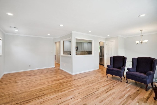 1126 Park Blvd, Massapequa Park, NY 11762 - living area with light wood-type flooring, a chandelier, recessed lighting, and ornamental molding