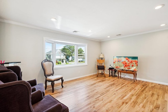 1126 Park Blvd, Massapequa Park, NY 11762 - living area with light wood-style flooring, ornamental molding, and recessed lighting