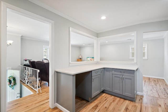 1126 Park Blvd, Massapequa Park, NY 11762 - bar featuring light wood-style flooring, recessed lighting, and crown molding