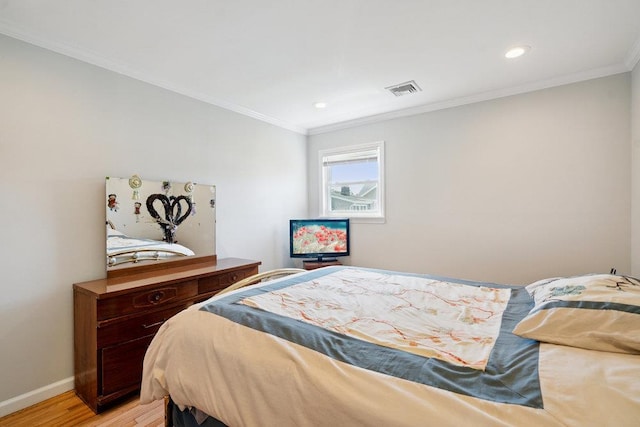 1126 Park Blvd, Massapequa Park, NY 11762 - bedroom featuring light wood-style floors, ornamental molding, and recessed lighting