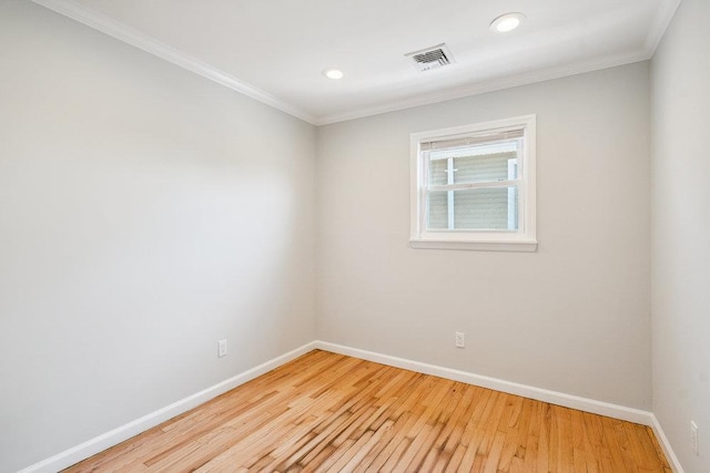 1126 Park Blvd, Massapequa Park, NY 11762 - empty room featuring light wood-style floors, ornamental molding, and recessed lighting