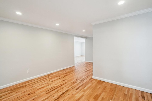 1126 Park Blvd, Massapequa Park, NY 11762 - empty room with ornamental molding, recessed lighting, and light wood finished floors