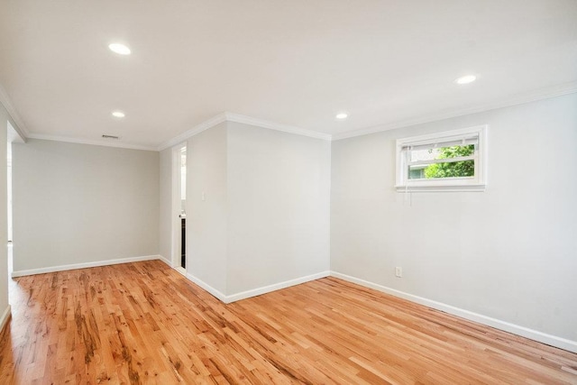 1126 Park Blvd, Massapequa Park, NY 11762 - empty room with recessed lighting, light wood-style floors, and ornamental molding