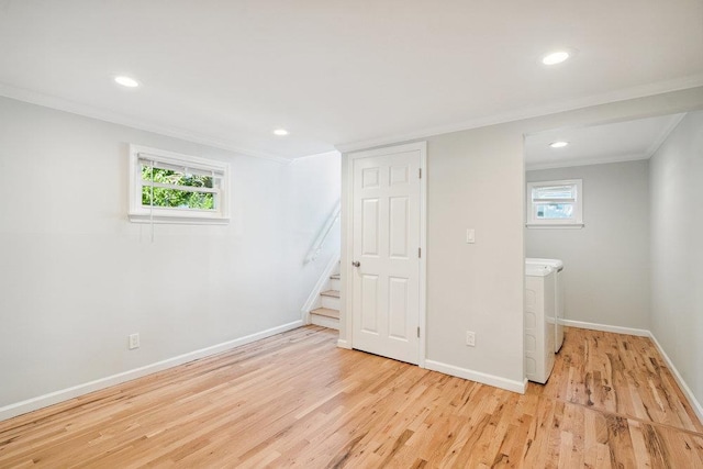 1126 Park Blvd, Massapequa Park, NY 11762 - below grade area featuring ornamental molding, light wood-style floors, stairs, healthy amount of natural light, and recessed lighting