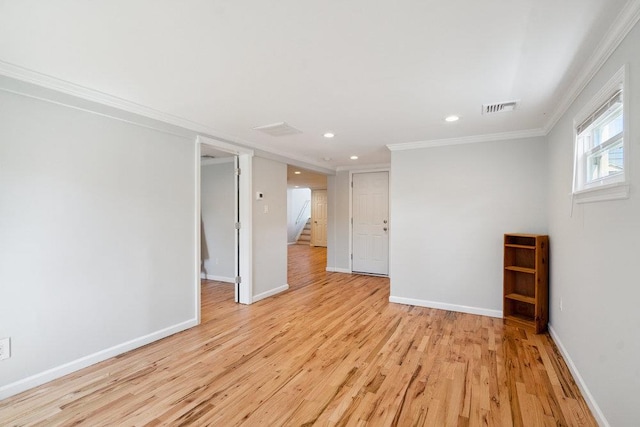 1126 Park Blvd, Massapequa Park, NY 11762 - empty room with ornamental molding, recessed lighting, light wood finished floors, and stairs