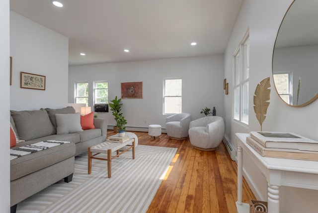 14 Staples St, Kingston, NY 12401 - living room with recessed lighting, a baseboard heating unit, and light wood-style flooring