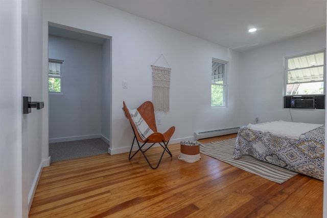 14 Staples St, Kingston, NY 12401 - bedroom with a baseboard radiator, cooling unit, multiple windows, and recessed lighting