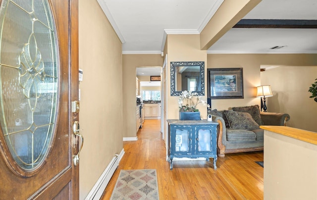 13 Stillman Rd, Glen Cove, NY 11542 - entrance foyer with a baseboard radiator, light wood-style flooring, and crown molding