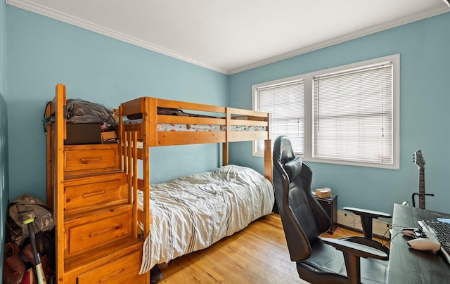 13 Stillman Rd, Glen Cove, NY 11542 - bedroom with crown molding, wood finished floors, and a desk