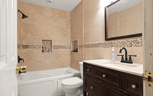 13 Stillman Rd, Glen Cove, NY 11542 - full bath with tile walls, vanity, and bathtub / shower combination