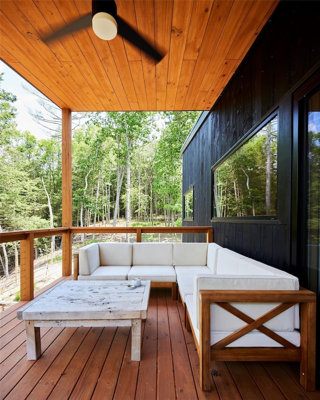 224 Upper Lumber Rd, Glen Spey, NY 12737 - wooden terrace with an outdoor living space, a view of trees, and a ceiling fan