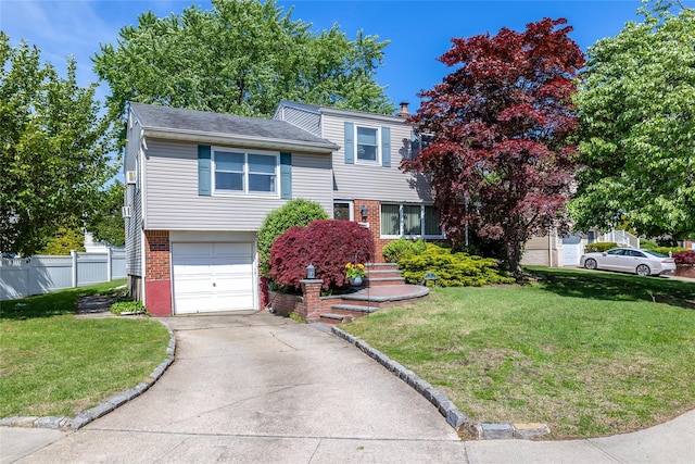 7 Garnet Ln, Plainview, NY 11803 - tri-level home with brick siding, a garage, concrete driveway, and a chimney