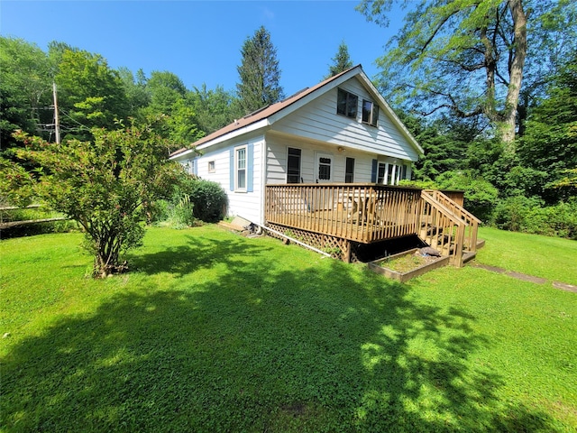 1485 Briscoe Rd, Swan Lake, NY 12783 - back of property with a yard and a deck