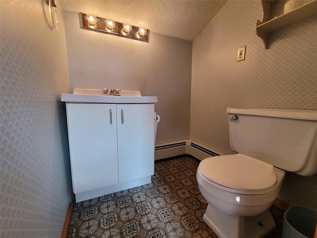 1485 Briscoe Rd, Swan Lake, NY 12783 - half bath with vanity, a baseboard heating unit, a textured ceiling, and wallpapered walls