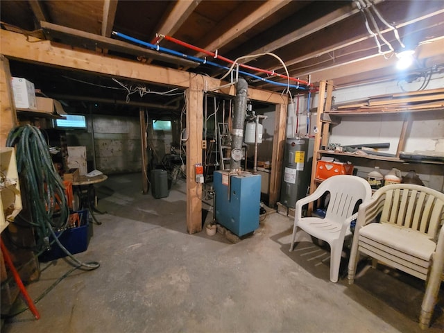 1485 Briscoe Rd, Swan Lake, NY 12783 - unfinished below grade area with electric water heater and a heating unit