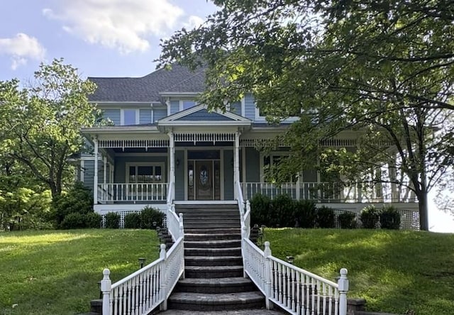 25 Lake Gilead Rd, Carmel, NY 10512 - victorian house with a porch, stairway, a front lawn, and a shingled roof
