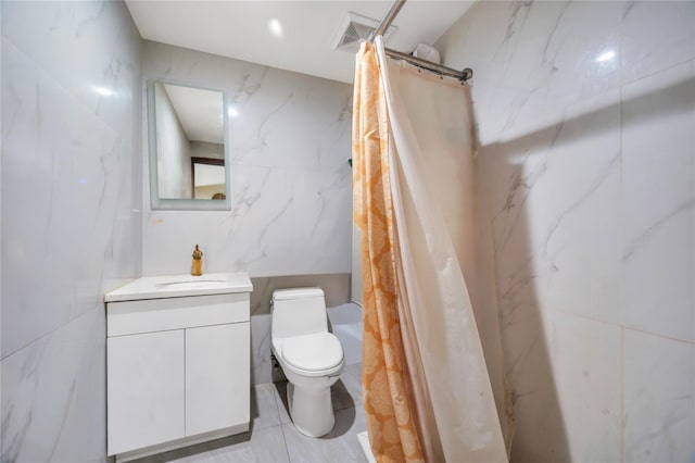 7425 43rd Ave Unit 2A, Elmhurst, NY 11373 - full bath with vanity, tile walls, tile patterned floors, and shower / bath combination with curtain