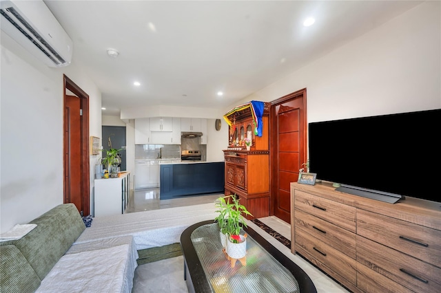 7425 43rd Ave Unit 2A, Elmhurst, NY 11373 - living area with a wall mounted AC and recessed lighting