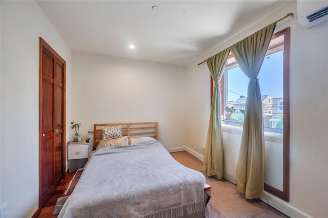 7425 43rd Ave Unit 2A, Elmhurst, NY 11373 - bedroom featuring a wall mounted air conditioner and recessed lighting