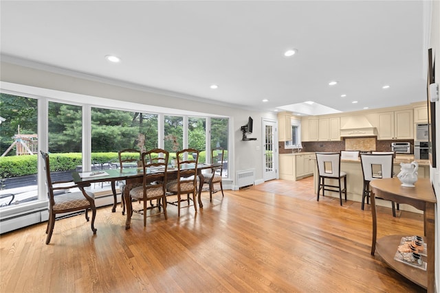 156 Lefferts Rd, Woodmere, NY 11598 - dining room with crown molding, light wood-style floors, and recessed lighting
