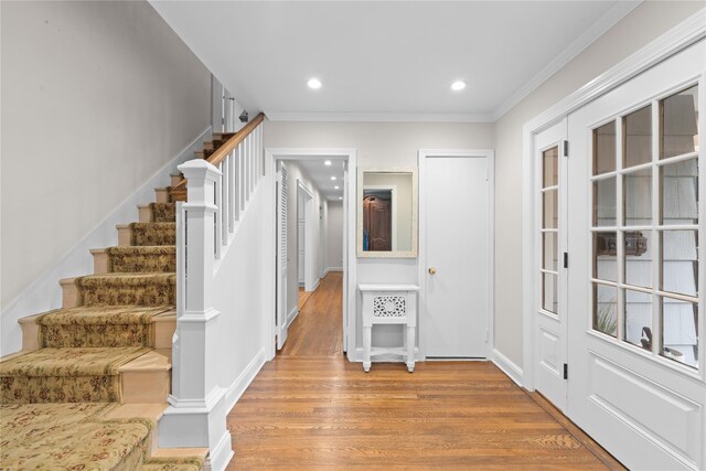 156 Lefferts Rd, Woodmere, NY 11598 - foyer entrance with stairway, wood finished floors, ornamental molding, and recessed lighting