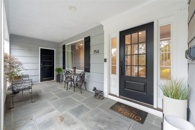 156 Lefferts Rd, Woodmere, NY 11598 - doorway to property featuring a porch