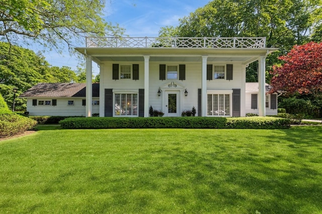 107 S Country Rd, East Patchogue, NY 11772 - neoclassical home featuring a front yard