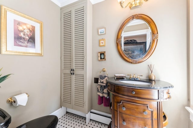 107 S Country Rd, East Patchogue, NY 11772 - bathroom with a closet, baseboard heating, and vanity