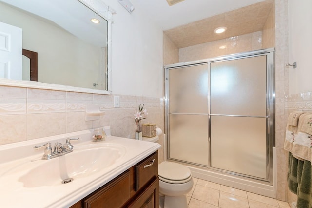 107 S Country Rd, East Patchogue, NY 11772 - full bath featuring vanity, tile patterned flooring, a shower stall, tile walls, and recessed lighting