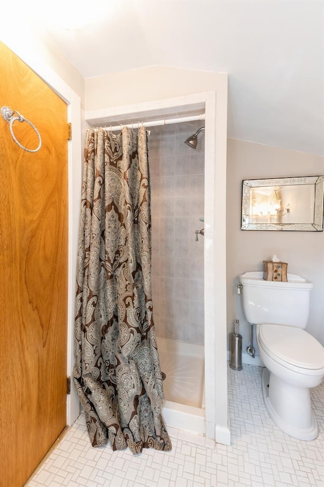 107 S Country Rd, East Patchogue, NY 11772 - bathroom featuring a tile shower and vaulted ceiling