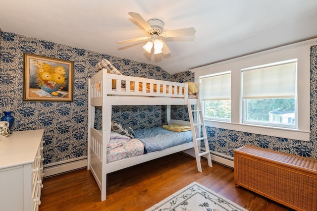 107 S Country Rd, East Patchogue, NY 11772 - bedroom featuring wallpapered walls, wood finished floors, baseboard heating, and ceiling fan