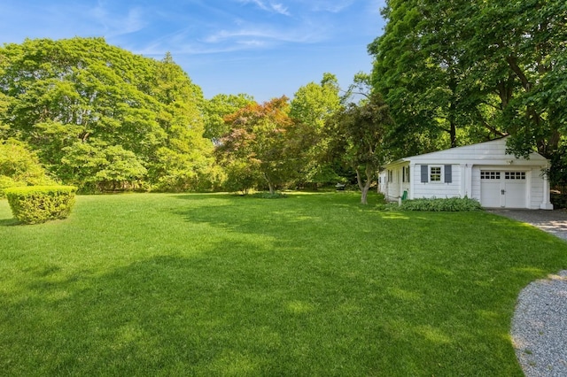 107 S Country Rd, East Patchogue, NY 11772 - view of grassy yard with an outbuilding and driveway
