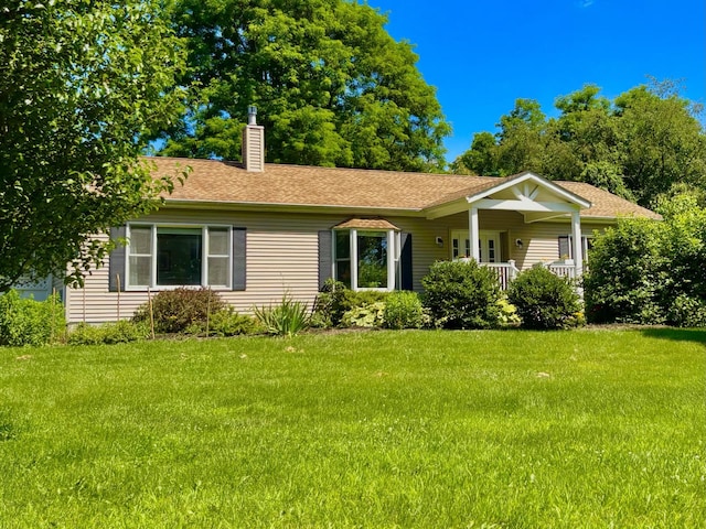 167 Benner Rd, Red Hook, NY 12571 - ranch-style home featuring a chimney, a front lawn, and roof with shingles
