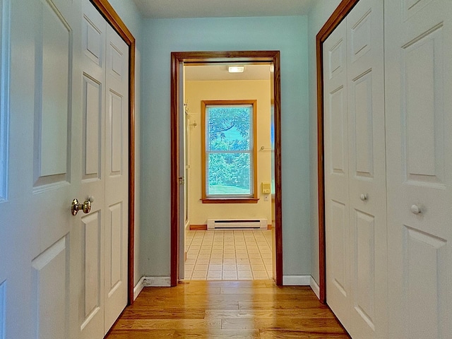 167 Benner Rd, Red Hook, NY 12571 - hall with a baseboard radiator and light wood finished floors