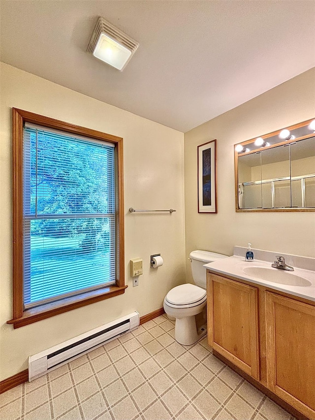 167 Benner Rd, Red Hook, NY 12571 - bathroom with a baseboard heating unit, vanity, a shower, and tile patterned floors