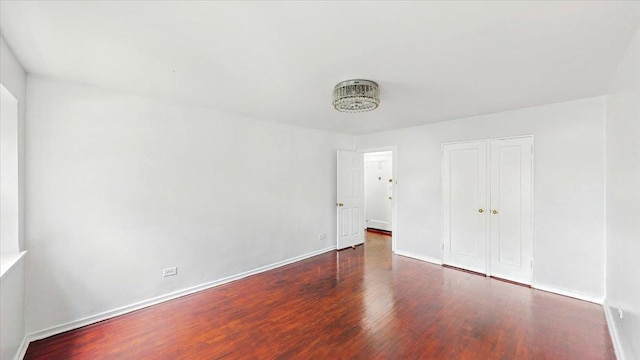 144-37 79th Ave Unit 1R, Kew Garden Hills, NY 11367 - unfurnished bedroom with wood finished floors and a closet