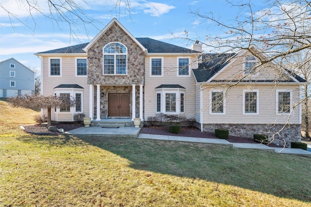 10 Von Trapp Ct, Washingtonville, NY 10992 - view of front of home featuring a chimney and a front lawn