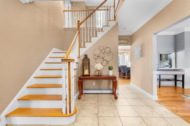 10 Von Trapp Ct, Washingtonville, NY 10992 - staircase featuring a baseboard radiator, crown molding, and tile patterned floors