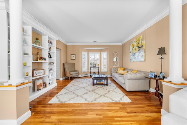 10 Von Trapp Ct, Washingtonville, NY 10992 - living room with ornate columns, light wood finished floors, and ornamental molding